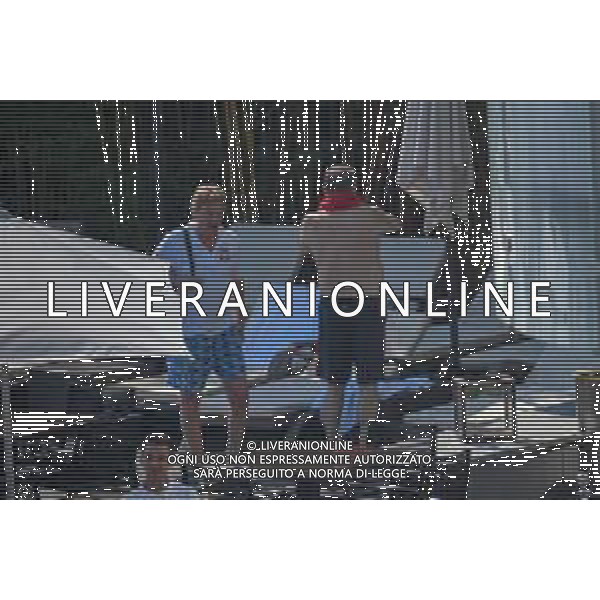 !!! EXCLUSIVE PHOTOS!!! !!! UWAGA ZDJECIA PAPARAZZI !!! BRAK ZGODY NA PUBLIKACJE WIZERUNKU !!! KADROWICZE PO PRZEGRANYM DRUGIM MECZU NA MUNDIALU RELAKSUJA SIE NA BASENIE. ZADOWOLENI USMIECHNIECI ZRELAKSOWANI WYCHODZA NA TRENING. WIEKSZOSC ZAWODNIKOW WYCHODZI Z TELEFONAMI NA TRENING. PRAWIE WSZYSCY SMIEJA SIE I SZUKAJA MIEJSCA SKAD SA ROBIONE IM ZDJECIA. JEDYNA PRZEJETA OSOBA JEST MICHAL PAZDAN KTORY CALY CZAS TRENINGU RZETELNIE PRACOWAL W SKUPIENIU I ZOSTAL JAKO OSTATNI Z DRUZYNY. MUNDIAL 2018 25.06.2018 SOCHI TOBIASZ/NEWSPIX --- Newspix.pl NZ ZBIGNIEW BONIEK Polish national team training in Sochi, part of the players training on the pitch, those who played with Colombia are training in the hotel, by the pool POLAND OUT!!! AG ALDO LIVERANI SAS-ONLY ITALY