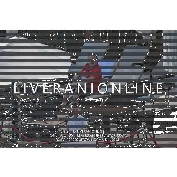 !!! EXCLUSIVE PHOTOS!!! !!! UWAGA ZDJECIA PAPARAZZI !!! BRAK ZGODY NA PUBLIKACJE WIZERUNKU !!! KADROWICZE PO PRZEGRANYM DRUGIM MECZU NA MUNDIALU RELAKSUJA SIE NA BASENIE. ZADOWOLENI USMIECHNIECI ZRELAKSOWANI WYCHODZA NA TRENING. WIEKSZOSC ZAWODNIKOW WYCHODZI Z TELEFONAMI NA TRENING. PRAWIE WSZYSCY SMIEJA SIE I SZUKAJA MIEJSCA SKAD SA ROBIONE IM ZDJECIA. JEDYNA PRZEJETA OSOBA JEST MICHAL PAZDAN KTORY CALY CZAS TRENINGU RZETELNIE PRACOWAL W SKUPIENIU I ZOSTAL JAKO OSTATNI Z DRUZYNY. MUNDIAL 2018 25.06.2018 SOCHI TOBIASZ/NEWSPIX --- Newspix.pl Polish national team training in Sochi, part of the players training on the pitch, those who played with Colombia are training in the hotel, by the pool POLAND OUT!!! AG ALDO LIVERANI SAS-ONLY ITALY