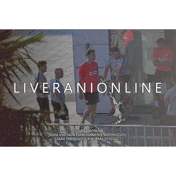 !!! EXCLUSIVE PHOTOS!!! !!! UWAGA ZDJECIA PAPARAZZI !!! BRAK ZGODY NA PUBLIKACJE WIZERUNKU !!! KADROWICZE PO PRZEGRANYM DRUGIM MECZU NA MUNDIALU RELAKSUJA SIE NA BASENIE. ZADOWOLENI USMIECHNIECI ZRELAKSOWANI WYCHODZA NA TRENING. WIEKSZOSC ZAWODNIKOW WYCHODZI Z TELEFONAMI NA TRENING. PRAWIE WSZYSCY SMIEJA SIE I SZUKAJA MIEJSCA SKAD SA ROBIONE IM ZDJECIA. JEDYNA PRZEJETA OSOBA JEST MICHAL PAZDAN KTORY CALY CZAS TRENINGU RZETELNIE PRACOWAL W SKUPIENIU I ZOSTAL JAKO OSTATNI Z DRUZYNY. NA WOJCIECH SZCZESNY MUNDIAL 2018 25.06.2018 SOCHI TOBIASZ/NEWSPIX --- Newspix.pl Polish national team training in Sochi, part of the players training on the pitch, those who played with Colombia are training in the hotel, by the pool POLAND OUT!!! AG ALDO LIVERANI SAS-ONLY ITALY