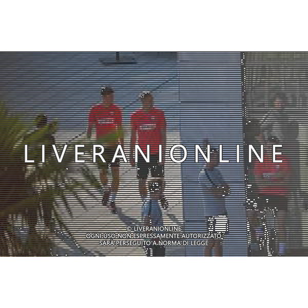 !!! EXCLUSIVE PHOTOS!!! !!! UWAGA ZDJECIA PAPARAZZI !!! BRAK ZGODY NA PUBLIKACJE WIZERUNKU !!! KADROWICZE PO PRZEGRANYM DRUGIM MECZU NA MUNDIALU RELAKSUJA SIE NA BASENIE. ZADOWOLENI USMIECHNIECI ZRELAKSOWANI WYCHODZA NA TRENING. WIEKSZOSC ZAWODNIKOW WYCHODZI Z TELEFONAMI NA TRENING. PRAWIE WSZYSCY SMIEJA SIE I SZUKAJA MIEJSCA SKAD SA ROBIONE IM ZDJECIA. JEDYNA PRZEJETA OSOBA JEST MICHAL PAZDAN KTORY CALY CZAS TRENINGU RZETELNIE PRACOWAL W SKUPIENIU I ZOSTAL JAKO OSTATNI Z DRUZYNY. MUNDIAL 2018 25.06.2018 SOCHI TOBIASZ/NEWSPIX --- Newspix.pl NZ DAWID KOWNACKI I LUKASZ TEODORCZYK Polish national team training in Sochi, part of the players training on the pitch, those who played with Colombia are training in the hotel, by the pool POLAND OUT!!! AG ALDO LIVERANI SAS-ONLY ITALY