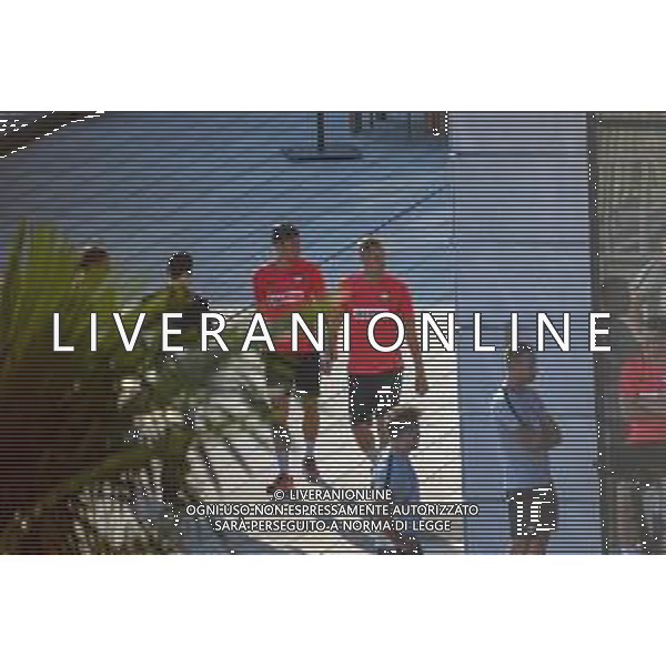 !!! EXCLUSIVE PHOTOS!!! !!! UWAGA ZDJECIA PAPARAZZI !!! BRAK ZGODY NA PUBLIKACJE WIZERUNKU !!! KADROWICZE PO PRZEGRANYM DRUGIM MECZU NA MUNDIALU RELAKSUJA SIE NA BASENIE. ZADOWOLENI USMIECHNIECI ZRELAKSOWANI WYCHODZA NA TRENING. WIEKSZOSC ZAWODNIKOW WYCHODZI Z TELEFONAMI NA TRENING. PRAWIE WSZYSCY SMIEJA SIE I SZUKAJA MIEJSCA SKAD SA ROBIONE IM ZDJECIA. JEDYNA PRZEJETA OSOBA JEST MICHAL PAZDAN KTORY CALY CZAS TRENINGU RZETELNIE PRACOWAL W SKUPIENIU I ZOSTAL JAKO OSTATNI Z DRUZYNY. MUNDIAL 2018 25.06.2018 SOCHI TOBIASZ/NEWSPIX --- Newspix.pl NZ DAWID KOWNACKI I LUKASZ TEODORCZYK Polish national team training in Sochi, part of the players training on the pitch, those who played with Colombia are training in the hotel, by the pool POLAND OUT!!! AG ALDO LIVERANI SAS-ONLY ITALY