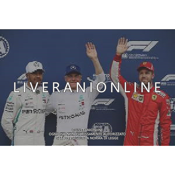 Qualifying top three in parc ferme (L to R): Lewis Hamilton (GBR) Mercedes AMG F1, second; Valtteri Bottas (FIN) Mercedes AMG F1, pole position; Sebastian Vettel (GER) Ferrari, third. 30.06.2018. Formula 1 World Championship, Rd 9, Austrian Grand Prix, Spielberg, Austria, Qualifying Day. / AGENZIA ALDO LIVERANI SAS - ITALY ONLY EDITORIAL USE ONLY - F1 Gp Austria, Prove Ufficiali Qualifiche 30.06.2018
