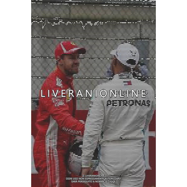 (L to R): Sebastian Vettel (GER) Ferrari with Lewis Hamilton (GBR) Mercedes AMG F1 in qualifying parc ferme. 30.06.2018. Formula 1 World Championship, Rd 9, Austrian Grand Prix, Spielberg, Austria, Qualifying Day. / AGENZIA ALDO LIVERANI SAS - ITALY ONLY EDITORIAL USE ONLY - F1 Gp Austria, Prove Ufficiali Qualifiche 30.06.2018