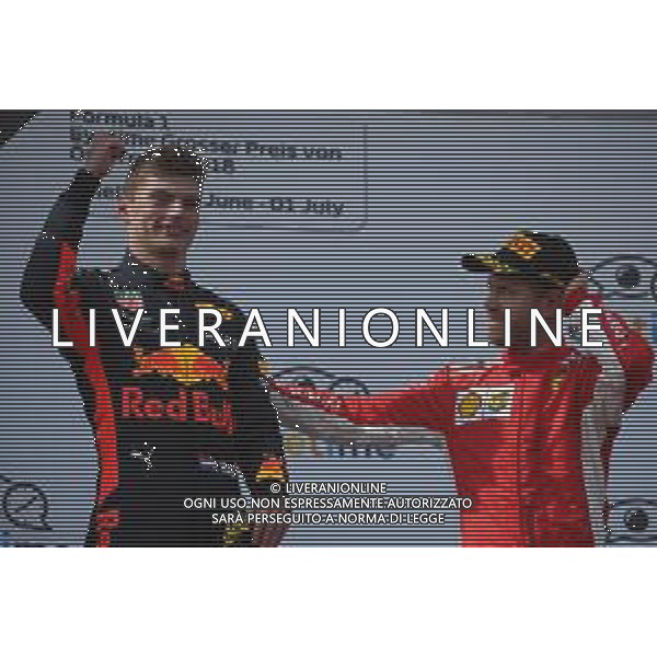 1st place Max Verstappen (NLD) Red Bull Racing RB14 and 3rd place Sebastian Vettel (GER) Ferrari SF71H. 01.07.2018. Formula 1 World Championship, Rd 9, Austrian Grand Prix, Spielberg, Austria, Race Day. / AGENZIA ALDO LIVERANI SAS - ITALY ONLY EDITORIAL USE ONLY - F1 GP AUSTRIA GARA 01.07.2018