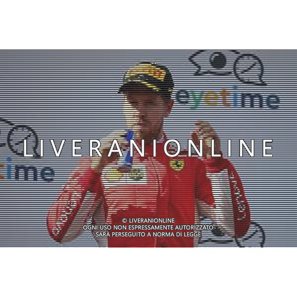 3rd place Sebastian Vettel (GER) Ferrari SF71H with a can of Red Bull. 01.07.2018. Formula 1 World Championship, Rd 9, Austrian Grand Prix, Spielberg, Austria, Race Day. / AGENZIA ALDO LIVERANI SAS - ITALY ONLY EDITORIAL USE ONLY - F1 GP AUSTRIA GARA 01.07.2018
