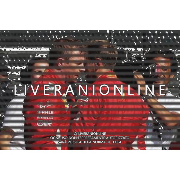 (L to R): Kimi Raikkonen (FIN) Ferrari with team mate Sebastian Vettel (GER) Ferrari in parc ferme. 01.07.2018. Formula 1 World Championship, Rd 9, Austrian Grand Prix, Spielberg, Austria, Race Day. / AGENZIA ALDO LIVERANI SAS - ITALY ONLY EDITORIAL USE ONLY - F1 GP AUSTRIA GARA 01.07.2018