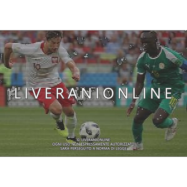 FIFA World Cup Russia 2018 Match No. 015, 2018-06-19 Poland vs Senegal Spartak Stadium PILKA NOZNA MISTRZOSTWA SWIATA W PILCE NOZNEJ MUNDIAL ROSJA 2018 POLSKA - SENEGAL FOT. JOHN BOTOS PROJECT PLUS/NEWSPIX.PL --- Newspix.pl Grzegorz KRYCHOWIAK (POL) Sadio MANE (SEN) AG ALDO LIVERANI SAS-ONLY ITALY