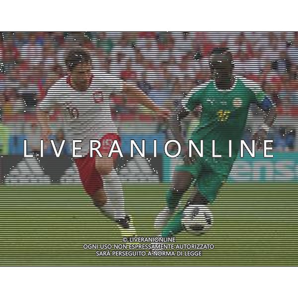 FIFA World Cup Russia 2018 Match No. 015, 2018-06-19 Poland vs Senegal Spartak Stadium PILKA NOZNA MISTRZOSTWA SWIATA W PILCE NOZNEJ MUNDIAL ROSJA 2018 POLSKA - SENEGAL FOT. JOHN BOTOS PROJECT PLUS/NEWSPIX.PL --- Newspix.pl Grzegorz KRYCHOWIAK (POL) Sadio MANE (SEN) AG ALDO LIVERANI SAS-ONLY ITALY