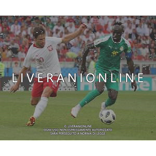 FIFA World Cup Russia 2018 Match No. 015, 2018-06-19 Poland vs Senegal Spartak Stadium PILKA NOZNA MISTRZOSTWA SWIATA W PILCE NOZNEJ MUNDIAL ROSJA 2018 POLSKA - SENEGAL FOT. JOHN BOTOS PROJECT PLUS/NEWSPIX.PL --- Newspix.pl Grzegorz KRYCHOWIAK (POL) Sadio MANE (SEN) AG ALDO LIVERANI SAS-ONLY ITALY