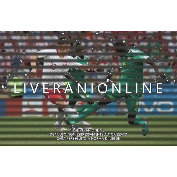 FIFA World Cup Russia 2018 Match No. 015, 2018-06-19 Poland vs Senegal Spartak Stadium PILKA NOZNA MISTRZOSTWA SWIATA W PILCE NOZNEJ MUNDIAL ROSJA 2018 POLSKA - SENEGAL FOT. JOHN BOTOS PROJECT PLUS/NEWSPIX.PL --- Newspix.pl Dawid KOWNACKI (POL) Cheikhou KOUYATE (SEN) AG ALDO LIVERANI SAS-ONLY ITALY