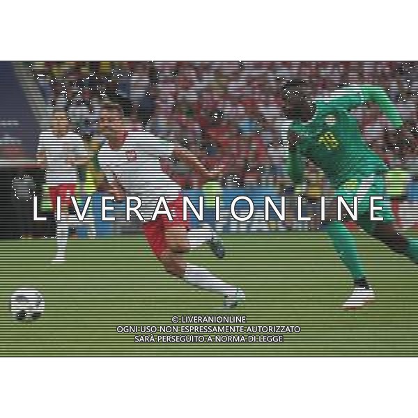 FIFA World Cup Russia 2018 Match No. 015, 2018-06-19 Poland vs Senegal Spartak Stadium PILKA NOZNA MISTRZOSTWA SWIATA W PILCE NOZNEJ MUNDIAL ROSJA 2018 POLSKA - SENEGAL FOT. JOHN BOTOS PROJECT PLUS/NEWSPIX.PL --- Newspix.pl Thiago CIONEK (POL) Mbaye NIANG (SEN) AG ALDO LIVERANI SAS-ONLY ITALY