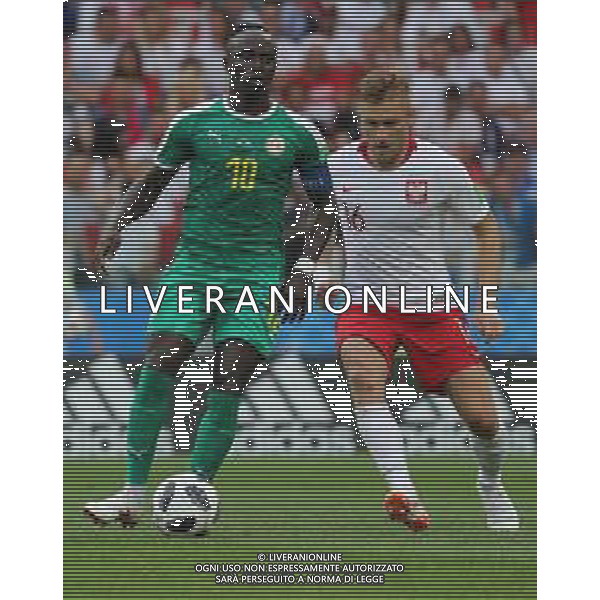 FIFA World Cup Russia 2018 Match No. 015, 2018-06-19 Poland vs Senegal Spartak Stadium PILKA NOZNA MISTRZOSTWA SWIATA W PILCE NOZNEJ MUNDIAL ROSJA 2018 POLSKA - SENEGAL FOT. JOHN BOTOS PROJECT PLUS/NEWSPIX.PL --- Newspix.pl Sadio MANE (SEN) & Jakub BLASZCZYKOWSKI (POL) AG ALDO LIVERANI SAS-ONLY ITALY