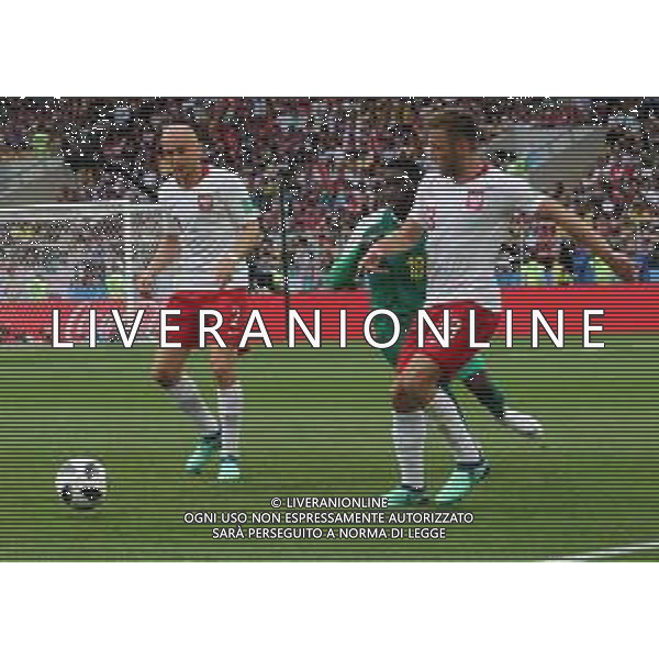 FIFA World Cup Russia 2018 Match No. 015, 2018-06-19 Poland vs Senegal Spartak Stadium PILKA NOZNA MISTRZOSTWA SWIATA W PILCE NOZNEJ MUNDIAL ROSJA 2018 POLSKA - SENEGAL FOT. JOHN BOTOS PROJECT PLUS/NEWSPIX.PL --- Newspix.pl Ismaila SARR (SEN) Michal PAZDAN (POL) Maciej RYBUS (POL) AG ALDO LIVERANI SAS-ONLY ITALY