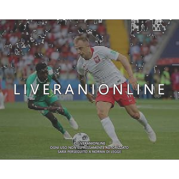 FIFA World Cup Russia 2018 Match No. 015, 2018-06-19 Poland vs Senegal Spartak Stadium PILKA NOZNA MISTRZOSTWA SWIATA W PILCE NOZNEJ MUNDIAL ROSJA 2018 POLSKA - SENEGAL FOT. JOHN BOTOS PROJECT PLUS/NEWSPIX.PL --- Newspix.pl Moussa WAGUE (SEN) & Kamil GROSICKI (POL) AG ALDO LIVERANI SAS-ONLY ITALY