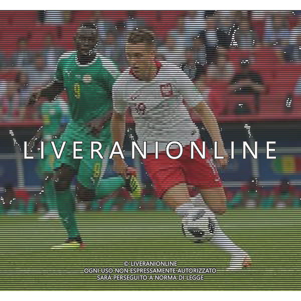 FIFA World Cup Russia 2018 Match No. 015, 2018-06-19 Poland vs Senegal Spartak Stadium PILKA NOZNA MISTRZOSTWA SWIATA W PILCE NOZNEJ MUNDIAL ROSJA 2018 POLSKA - SENEGAL FOT. JOHN BOTOS PROJECT PLUS/NEWSPIX.PL --- Newspix.pl Piotr ZIELINSKI (POL) Mame DIOUF (SEN) AG ALDO LIVERANI SAS-ONLY ITALY