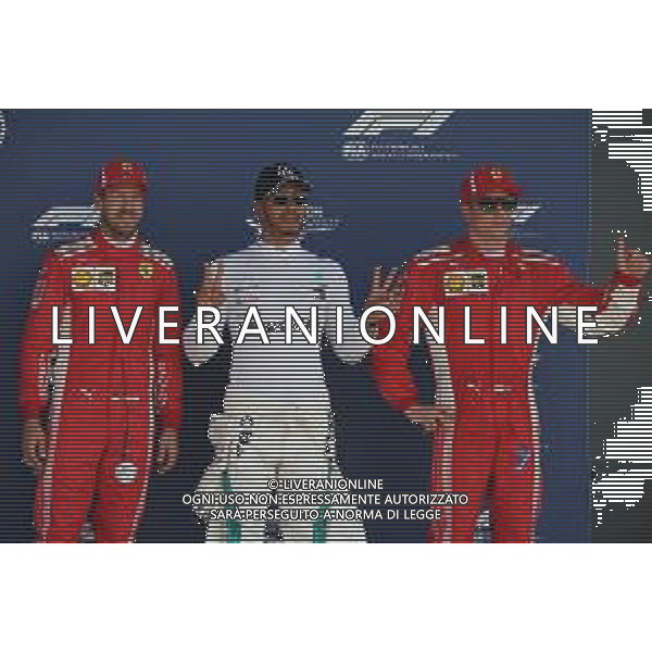 Pole for Lewis Hamilton (GBR) Mercedes AMG F1 W09, 2nd for Sebastian Vettel (GER) Ferrari SF71H and 3rd for Kimi Raikkonen (FIN) Ferrari SF71H. 07.07.2018. Formula 1 World Championship, Rd 10, British Grand Prix, Silverstone, England, Qualifying Day. / AGENZIA ALDO LIVERANI SAS - ITALY ONLY EDITORIAL USE ONLY - F1 GP INGHILTERRA GRAN BRETAGNA PROVE UFFICIALI QUALIFICHE 07.07.2018