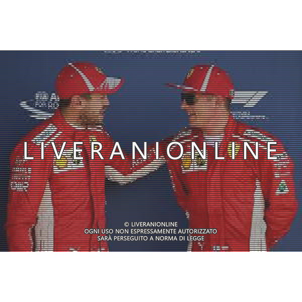 (L to R): Sebastian Vettel (GER) Ferrari with team mate Kimi Raikkonen (FIN) Ferrari in qualifying parc ferme. 07.07.2018. Formula 1 World Championship, Rd 10, British Grand Prix, Silverstone, England, Qualifying Day. / AGENZIA ALDO LIVERANI SAS - ITALY ONLY EDITORIAL USE ONLY - F1 GP INGHILTERRA GRAN BRETAGNA PROVE UFFICIALI QUALIFICHE 07.07.2018