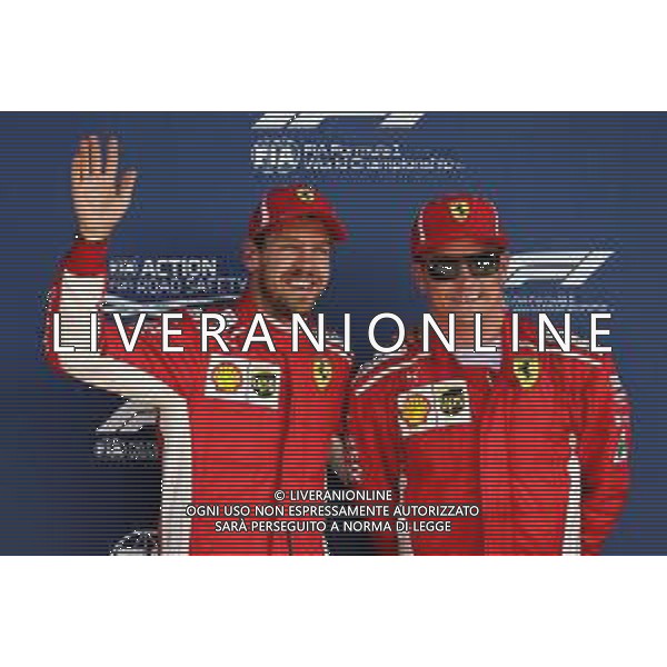 (L to R): Sebastian Vettel (GER) Ferrari with team mate Kimi Raikkonen (FIN) Ferrari in qualifying parc ferme. 07.07.2018. Formula 1 World Championship, Rd 10, British Grand Prix, Silverstone, England, Qualifying Day. / AGENZIA ALDO LIVERANI SAS - ITALY ONLY EDITORIAL USE ONLY - F1 GP INGHILTERRA GRAN BRETAGNA PROVE UFFICIALI QUALIFICHE 07.07.2018
