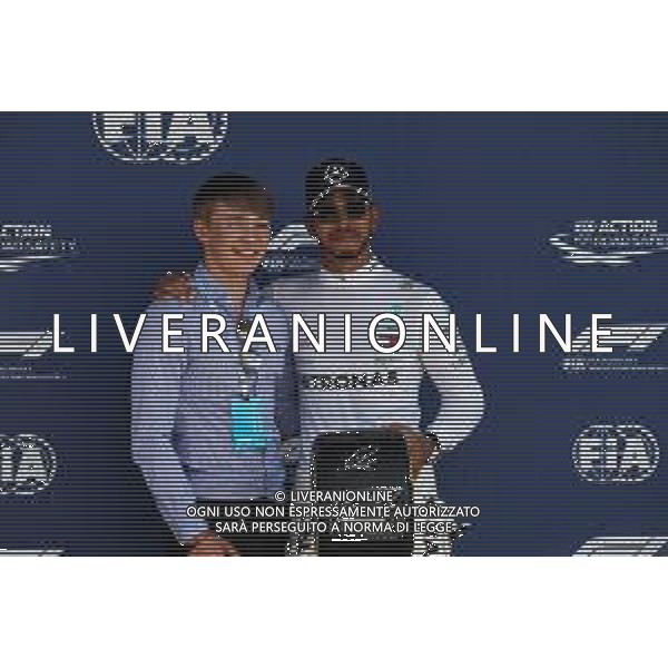 (L to R): Billy Monger (GBR) Racing Driver presents the Pirelli Pole Position award to Lewis Hamilton (GBR) Mercedes AMG F1. 07.07.2018. Formula 1 World Championship, Rd 10, British Grand Prix, Silverstone, England, Qualifying Day. / AGENZIA ALDO LIVERANI SAS - ITALY ONLY EDITORIAL USE ONLY - F1 GP INGHILTERRA GRAN BRETAGNA PROVE UFFICIALI QUALIFICHE 07.07.2018