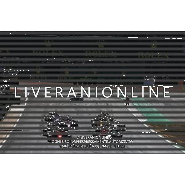 Lewis Hamilton (GBR) Mercedes AMG F1 W09 and Sebastian Vettel (GER) Ferrari SF71H at the start of the race. 08.07.2018. Formula 1 World Championship, Rd 10, British Grand Prix, Silverstone, England, Race Day. / AGENZIA ALDO LIVERANI SAS - ITALY ONLY EDITORIAL USE ONLY - F1 Gp Inghilterra Gran Bretagna Gara 08-07-2018