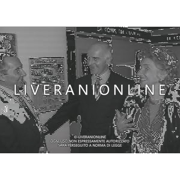 MILANO 1992 ARRIGO SACCHI AL NEGOZIO GOLD MARKET A MILANO CENTENARIO DELLA FEDERAZIONE ITALIANA GIOCO CALCIO NELLA FOTO CANDIDO CANNAVO\' RESY BONACOSSA E ARRIGO SACCHI AG ALDO LIVERANI SAS