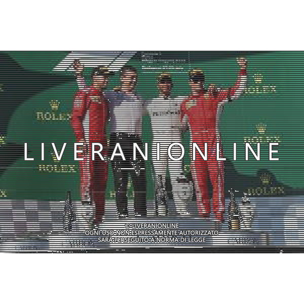 The podium (L to R): Sebastian Vettel (GER) Ferrari, second; Lewis Hamilton (GBR) Mercedes AMG F1, race winner; Kimi Raikkonen (FIN) Ferrari, third. 29.07.2018. Formula 1 World Championship, Rd 12, Hungarian Grand Prix, Budapest, Hungary, Race Day. /AGENZIA ALDO LIVERANI SAS - ITALY ONLY - EDITORIAL USE ONLY - F1 GP UNGHERIA GARA 29.07.2018
