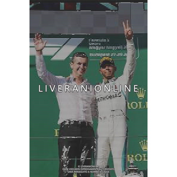 Race winner Lewis Hamilton (GBR) Mercedes AMG F1 celebrates on the podium. 29.07.2018. Formula 1 World Championship, Rd 12, Hungarian Grand Prix, Budapest, Hungary, Race Day. /AGENZIA ALDO LIVERANI SAS - ITALY ONLY - EDITORIAL USE ONLY - F1 GP UNGHERIA GARA 29.07.2018