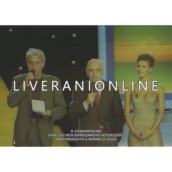 L’Oscar del calcio AIC 1999 fu la terza edizione dell\'Oscar del calcio AIC, la manifestazione in cui vengono premiati i protagonisti del calcio italiano dall\'Associazione Italiana Calciatori NELLA FOTO TEO TEOCOLI CON ADRIANO GALLIANI E MARTINA COLOMBARI AG ALDO LIVERANI SAS