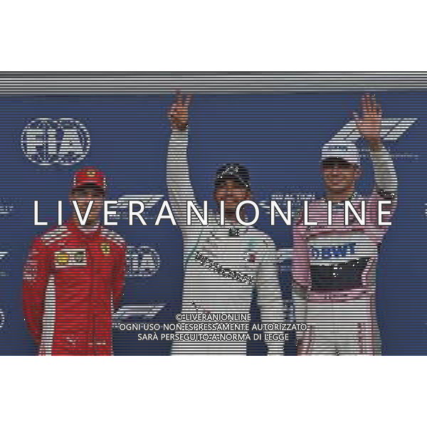 Qualifying top three in parc ferme (L to R): Sebastian Vettel (GER) Ferrari, second; Lewis Hamilton (GBR) Mercedes AMG F1, pole position; Esteban Ocon (FRA) Racing Point Force India F1 Team, third. 25.08.2018. Formula 1 World Championship, Rd 13, Belgian Grand Prix, Spa Francorchamps, Belgium, Qualifying Day. AG ALDO LIVERANI SAS-ONLY ITALY