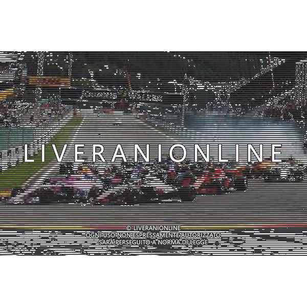 Sergio Perez (MEX) Racing Point Force India F1 VJM11 and Romain Grosjean (FRA) Haas F1 Team VF-18 at the start of the race. 26.08.2018. Formula 1 World Championship, Rd 13, Belgian Grand Prix, Spa Francorchamps, Belgium, Race Day. / AGENZIA ALDO LIVERANI SAS - ITALY ONLY EDITORIAL USE ONLY - Gp Belgio, Spa Francorchamps, Gara 26.08.2018.