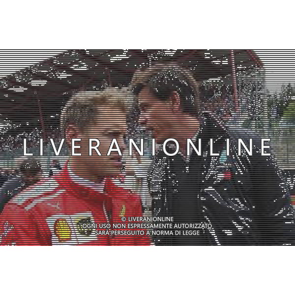 Sebastian Vettel (GER) Ferrari with Toto Wolff (GER) Mercedes AMG F1 Shareholder and Executive Director on the grid. 26.08.2018. Formula 1 World Championship, Rd 13, Belgian Grand Prix, Spa Francorchamps, Belgium, Race Day. AG ALDO LIVERANI SAS ONLY ITALY