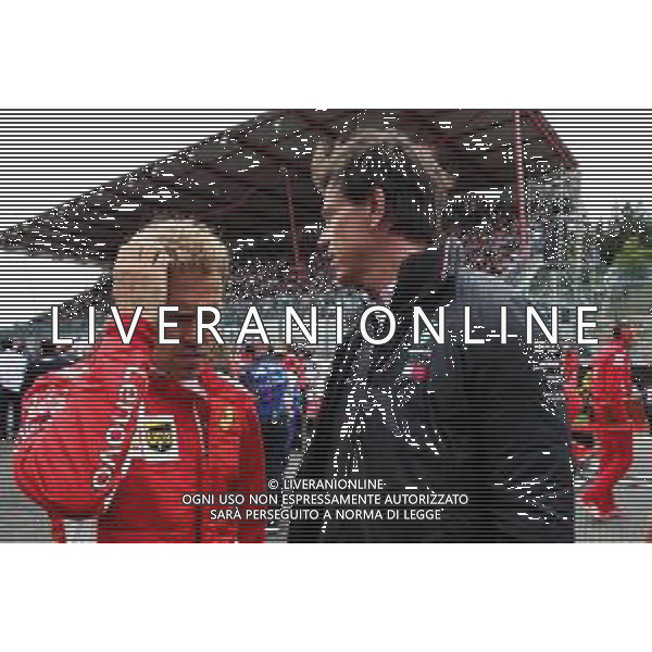 Sebastian Vettel (GER) Ferrari with Toto Wolff (GER) Mercedes AMG F1 Shareholder and Executive Director on the grid. 26.08.2018. Formula 1 World Championship, Rd 13, Belgian Grand Prix, Spa Francorchamps, Belgium, Race Day. AG ALDO LIVERANI SAS ONLY ITALY