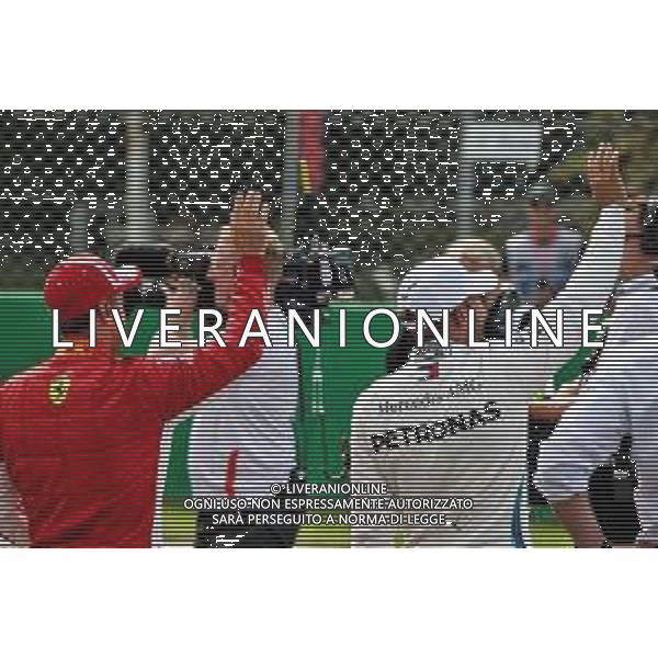 (L to R): Sebastian Vettel (GER) Ferrari and Lewis Hamilton (GBR) Mercedes AMG F1 in qualifying parc ferme. 01.09.2018. Formula 1 World Championship, Rd 14, Italian Grand Prix, Monza, Italy, Qualifying Day. AG ALDO LIVERANI SAS-ONLY ITALY