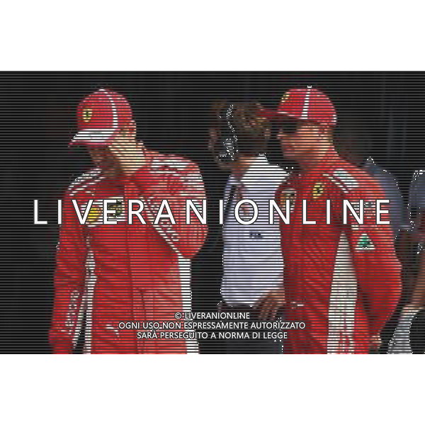 (L to R): Sebastian Vettel (GER) Ferrari with team mate and pole sitter Kimi Raikkonen (FIN) Ferrari in qualifying parc ferme. 01.09.2018. Formula 1 World Championship, Rd 14, Italian Grand Prix, Monza, Italy, Qualifying Day. AG ALDO LIVERANI SAS-ONLY ITALY