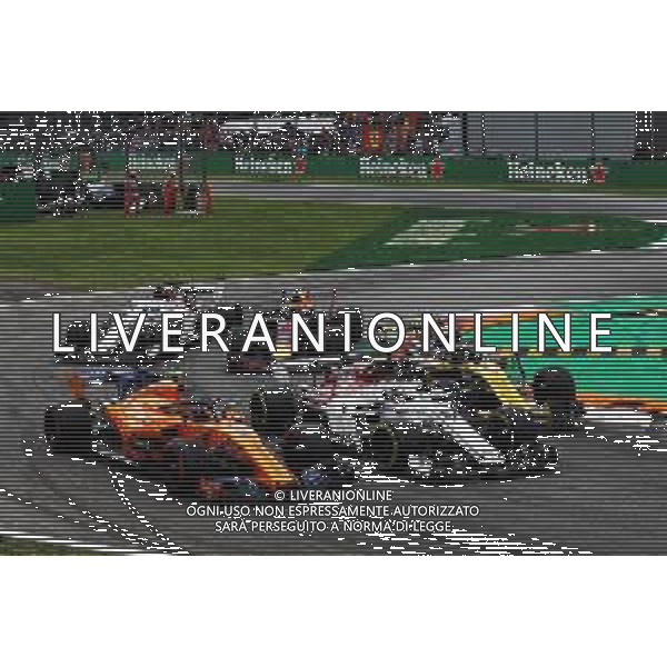 Stoffel Vandoorne (BEL) McLaren MCL33, Charles Leclerc (MON) Sauber F1 Team C37, and Nico Hulkenberg (GER) Renault Sport F1 Team RS18 at the start of the race. 02.09.2018. Formula 1 World Championship, Rd 14, Italian Grand Prix, Monza, Italy, Race Day. AG ALDO LIVERANI SAS-ONLY ITALY