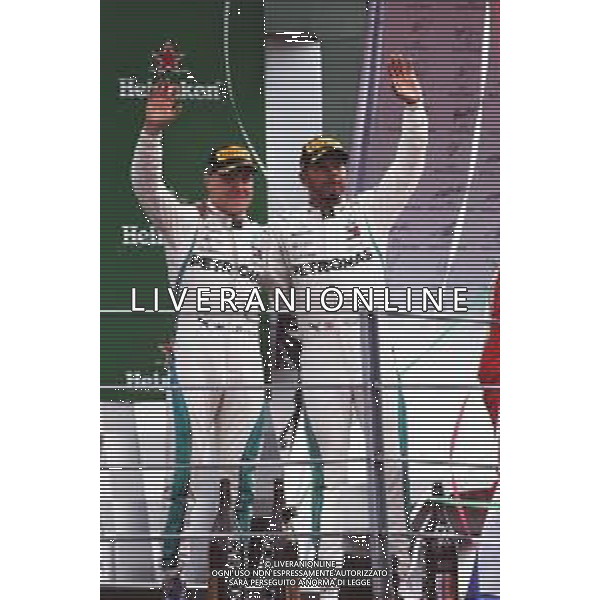 The podium (L to R): third placed Valtteri Bottas (FIN) Mercedes AMG F1 celebrates with race winner and team mate Lewis Hamilton (GBR) Mercedes AMG F1. 02.09.2018. Formula 1 World Championship, Rd 14, Italian Grand Prix, Monza, Italy, Race Day. AG ALDO LIVERANI SAS-ONLY ITALY