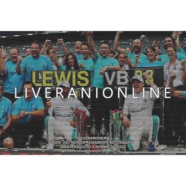 Race winner Lewis Hamilton (GBR) Mercedes AMG F1 celebrates with third placed Valtteri Bottas (FIN) Mercedes AMG F1 and the team. 02.09.2018. Formula 1 World Championship, Rd 14, Italian Grand Prix, Monza, Italy, Race Day. AG ALDO LIVERANI SAS-ONLY ITALY
