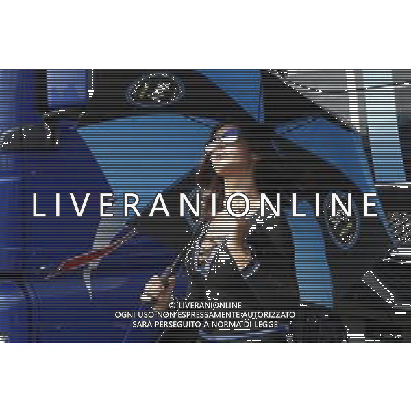 Misano - Motomondiale Gran Premio OCTO di San Marino e della Riviera di Rimini 08/09/2018 nella foto: ombrellina ©Claudio Zamagni/Agenzia Aldo Liverani umbrella girl at MotoGP OCTO of San Marino on September 08 2018 at Misano World Circuit Marco Simoncelli Misano Adriatico Italy photo credit by Claudio Zamagni/Aldo Liverani Photo Agency