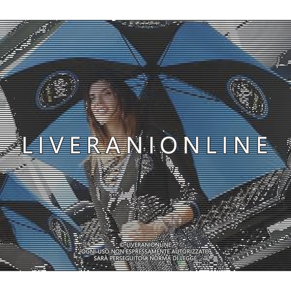 Misano - Motomondiale Gran Premio OCTO di San Marino e della Riviera di Rimini 08/09/2018 nella foto: ombrellia ©Claudio Zamagni/Agenzia Aldo Liverani umbrella girl at MotoGP OCTO of San Marino on September 08 2018 at Misano World Circuit Marco Simoncelli Misano Adriatico Italy photo credit by Claudio Zamagni/Aldo Liverani Photo Agency