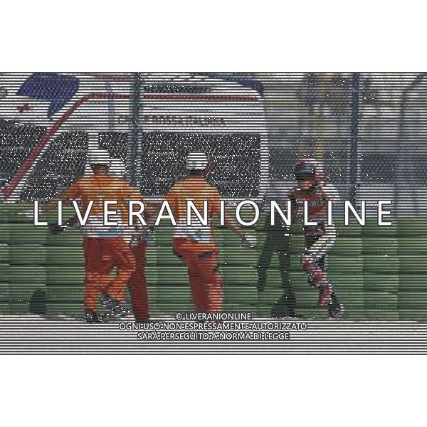 Misano - Motomondiale Gran Premio OCTO di San Marino e della Riviera di Rimini 08/09/2018 nella foto: Marc Marquez (REPSOL HONDA TEAM) dopo la caduta durante le qualifiche ©Claudio Zamagni/Agenzia Aldo Liverani Marc Marquez (REPSOL HONDA TEAM) after crush down during Qualifying MotoGP OCTO of San Marino on September 08 2018 at Misano World Circuit Marco Simoncelli Misano Adriatico Italy photo credit by Claudio Zamagni/Aldo Liverani Photo Agency / AGENZIA ALDO LIVERANI SAS