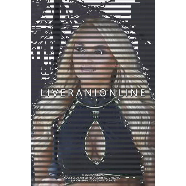 Misano - Motomondiale Gran Premio OCTO di San Marino e della Riviera di Rimini 08/09/2018 nella foto: ombrellina durante le qualifiche ©Claudio Zamagni/Agenzia Aldo Liverani umbrella girl during Qualifying MotoGP OCTO of San Marino on September 08 2018 at Misano World Circuit Marco Simoncelli Misano Adriatico Italy photo credit by Claudio Zamagni/Aldo Liverani Photo Agency / AGENZIA ALDO LIVERANI SAS