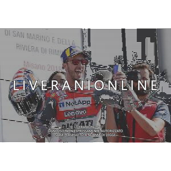 Misano - Motomondiale Gran Premio OCTO di San Marino e della Riviera di Rimini 09/09/2018 nella foto: esultanza Andrea Dovizioso (DUCATI TEAM) sul podio - MotoGp ©Claudio Zamagni/Agenzia Aldo Liverani Andrea Dovizioso (DUCATI TEAM) celebrates the victory after race during the race MotoGP OCTO of San Marino on September 09 2018 at Misano World Circuit Marco Simoncelli Misano Adriatico Italy photo credit by Claudio Zamagni/Aldo Liverani Photo Agency / AGENZIA ALDO LIVERANI SAS - Podio MotoGp