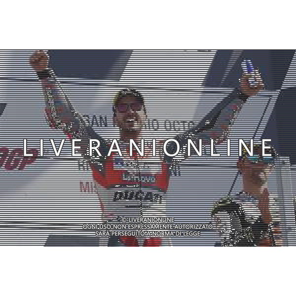 Misano - Motomondiale Gran Premio OCTO di San Marino e della Riviera di Rimini 09/09/2018 nella foto: esultanza Andrea Dovizioso (DUCATI TEAM) sul podio - MotoGp ©Claudio Zamagni/Agenzia Aldo Liverani Andrea Dovizioso (DUCATI TEAM) celebrates the victory after race during the race MotoGP OCTO of San Marino on September 09 2018 at Misano World Circuit Marco Simoncelli Misano Adriatico Italy photo credit by Claudio Zamagni/Aldo Liverani Photo Agency / AGENZIA ALDO LIVERANI SAS - Podio MotoGp