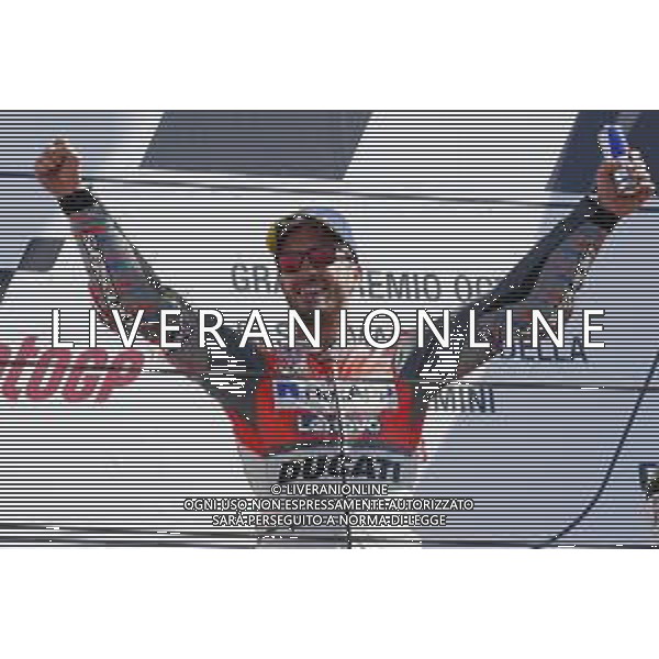 Misano - Motomondiale Gran Premio OCTO di San Marino e della Riviera di Rimini 09/09/2018 nella foto: esultanza Andrea Dovizioso (DUCATI TEAM) sul podio - MotoGp ©Claudio Zamagni/Agenzia Aldo Liverani Andrea Dovizioso (DUCATI TEAM) celebrates the victory after race MotoGP OCTO of San Marino on September 09 2018 at Misano World Circuit Marco Simoncelli Misano Adriatico Italy photo credit by Claudio Zamagni/Aldo Liverani Photo Agency / AGENZIA ALDO LIVERANI SAS - Podio MotoGp