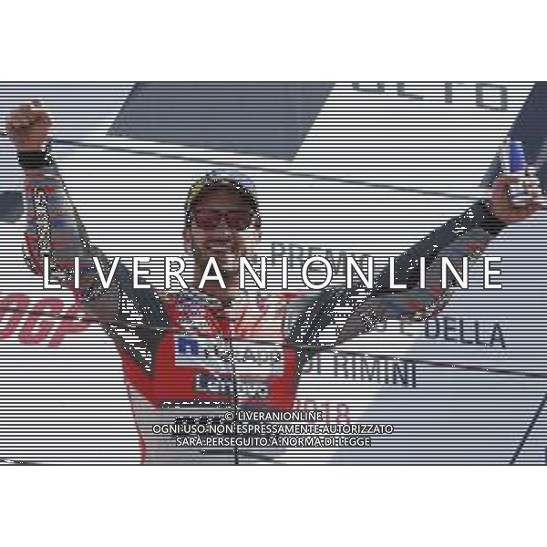 Misano - Motomondiale Gran Premio OCTO di San Marino e della Riviera di Rimini 09/09/2018 nella foto: esultanza Andrea Dovizioso (DUCATI TEAM) sul podio - MotoGp ©Claudio Zamagni/Agenzia Aldo Liverani Andrea Dovizioso (DUCATI TEAM) celebrates the victory after race MotoGP OCTO of San Marino on September 09 2018 at Misano World Circuit Marco Simoncelli Misano Adriatico Italy photo credit by Claudio Zamagni/Aldo Liverani Photo Agency / AGENZIA ALDO LIVERANI SAS - Podio MotoGp