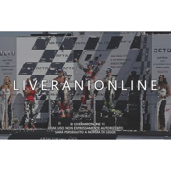 Misano Adriatico ( RN ) 09/09/2018 Misano World Circuit Marco Simoncelli. Gran Premio Octo di San Marino e della Riviera di Rimini 2018 - MOTOGP Premiazione Nella foto: 2° Class. Marc Marquez ( ESP ) su HONDA, l vincitore Andrea Dovizioso ( ITA ) su DUCATI e 3° Class. Cal Crutchlow ( GBR ) su HONDA sul podio PH Lauro Montagnini AG ALDO LIVERANI SAS