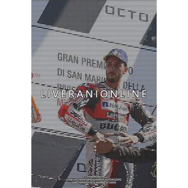 Misano Adriatico ( RN ) 09/09/2018 Misano World Circuit Marco Simoncelli. Gran Premio Octo di San Marino e della Riviera di Rimini 2018 - MOTOGP Premiazione Nella foto: Il vincitore Andrea Dovizioso ( ITA ) su DUCATI sul podio PH Lauro Montagnini AG ALDO LIVERANI SAS