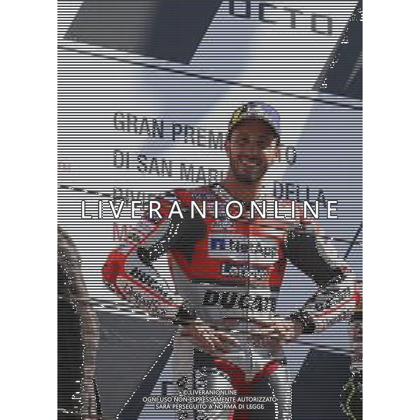 Misano Adriatico ( RN ) 09/09/2018 Misano World Circuit Marco Simoncelli. Gran Premio Octo di San Marino e della Riviera di Rimini 2018 - MOTOGP Premiazione Nella foto: Il vincitore Andrea Dovizioso ( ITA ) su DUCATI sul podio PH Lauro Montagnini AG ALDO LIVERANI SAS