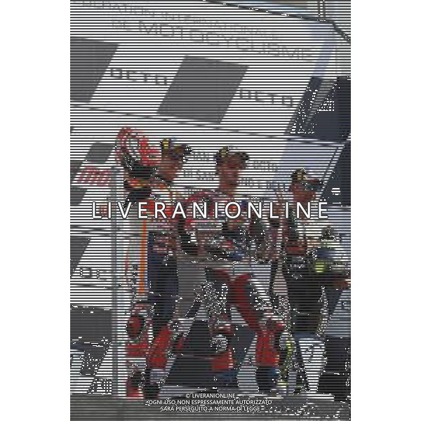 Misano Adriatico ( RN ) 09/09/2018 Misano World Circuit Marco Simoncelli. Gran Premio Octo di San Marino e della Riviera di Rimini 2018 - MOTOGP Premiazione Nella foto: 2° Class. Marc Marquez ( ESP ) su HONDA, l vincitore Andrea Dovizioso ( ITA ) su DUCATI e 3° Class. Cal Crutchlow ( GBR ) su HONDA sul podio PH Lauro Montagnini AG ALDO LIVERANI SAS