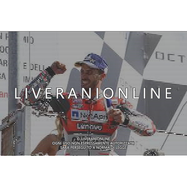 Misano Adriatico ( RN ) 09/09/2018 Misano World Circuit Marco Simoncelli. Gran Premio Octo di San Marino e della Riviera di Rimini 2018 - MOTOGP Premiazione Nella foto: Il vincitore Andrea Dovizioso ( ITA ) su DUCATI sul podio PH Lauro Montagnini AG ALDO LIVERANI SAS